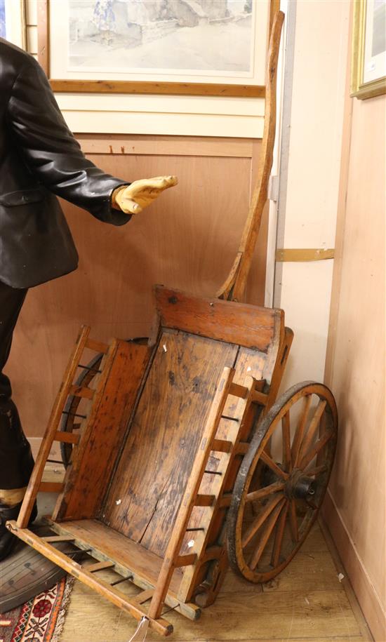 An early 20th century dog cart Length 196cm